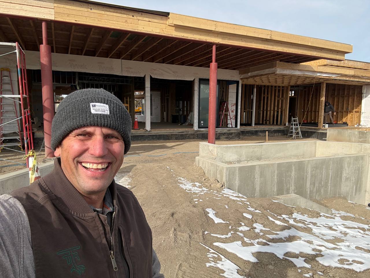 Mountain View Window & Door team member at active new construction installation site